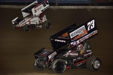 Scotty Thiel (73) and Rico Abreu (24) battle in Pevely (Mark Funderburk Racing Photo)