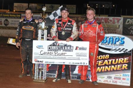 Chad Boat (middle) stands in BAPS Motor Speedway victory lane following his "Pennsylvania Midget Week" win alongside 2nd place finisher Zeb Wise (right) and 3rd place Brady Bacon (left). (Chad Warner Photo)