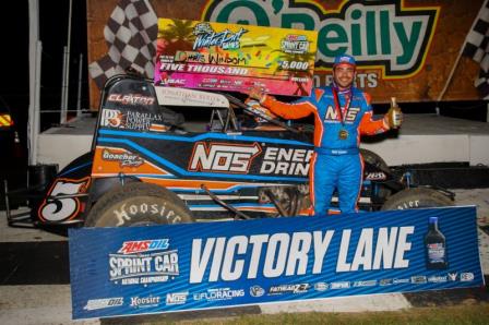 Chris Windom celebrates Thursday night's USAC AMSOIL National Sprint Car season-opening victory at Bubba Raceway Park. (Rich Forman Photo)