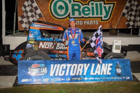 Justin Grant celebrates his victory on night two of "Winter Dirt Games X" Friday at Bubba Raceway Park. (Rich Forman Photo)