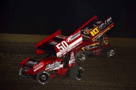 Craig Dollansky (50) and Jeremy Schultz (10w) battle at 34 Raceway (Mark Funderburk Photo)