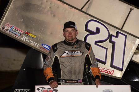 Carson Short celebrates his IRA/MOWA win Saturday at 34 Raceway (Mark Funderburk Photo)