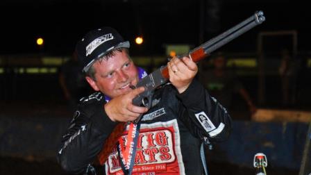 Chase Stockon aims the rifle after winning Wednesday's "Tony Hulman Classic." (Gene Crucean Photo)