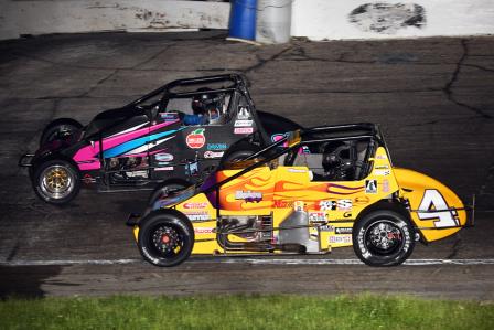 Kody Swanson (4) races under Bobby Santos during the Little 500 at Anderson (Ind.) Speedway. (David Nearpass photo) (Highlight Video from SpeedShiftTV.com)