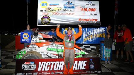 Brady Bacon celebrates with the $10,000 check after winning his third-straight Eastern Storm opener Tuesday at Grandview Speedway. (Rich Forman Photo) (Highlight Video from FloRacing.com)