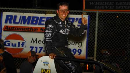 "Get this man a napkin!" Brady Bacon shows the wears in victory lane after his first career USAC Silver Crown victory Friday night at Williams Grove Speedway. (Rich Forman Photo)