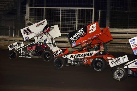 Dominic Scelzi (41s) and James McFadden (9) duel at Knoxville (Mark Funderburk Racing Photo)