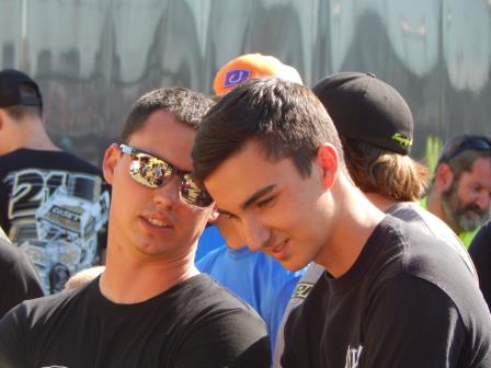 Cory Eliason talks things over with Gio Scelzi