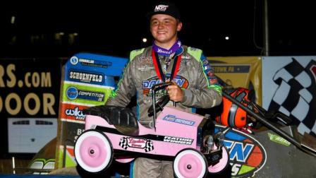 Zeb Wise proudly holds the pedal car trophy after capturing Friday night's Pennsylvania Midget Week feature at Linda's Speedway. (Michael Fry Photo) (Video Highlight from FloRacing.com)