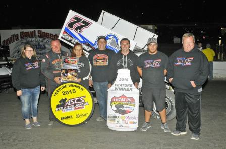 Photo: Wayne and the team in Victory Lane at Devil’s Bowl Speedway Friday (Rob Kocak Photo)