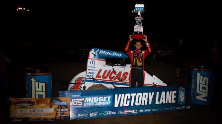 Kyle Larson hoists the trophy after winning his second consecutive USAC NOS Energy Drink National Midget feature Saturday night at California's Bakersfield Speedway (Rich Forman Photo) (Video Highlights from FloRacing.com)