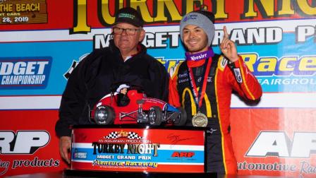 Kyle Larson (right) poses with Ventura Raceway promoter Jim Naylor following Friday night's Turkey Night Grand Prix victory (Rich Forman Photo) (Video Highlights from FloRacing.com)