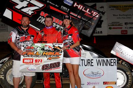 Dylan Westbrook celebrates his “Fall Haul” of $5,000 at 34 Raceway Saturday (MF Photography)