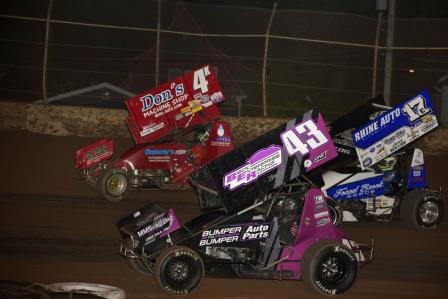 Bill Balog (17B) splits Kris Spitz (4K) and Jereme Schroeder (43) at Plymouth (Mark Funderburk Racing Photo)