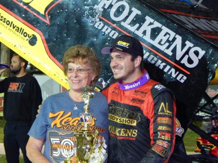 Aaron Reutzel celebrates his win with Shirley Kear Valentine