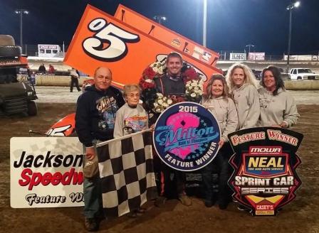 Photo: Brad in Victory Lane at Jacksonville with the Ron Milton family (Jacksonville Speedway Photo)