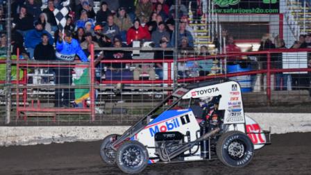 Buddy Kofoid (Penngrove, Calif.) races under the checkered flag during Saturday night's USAC NOS Energy Drink National Midget victory at Port City Raceway in Tulsa, Oklahoma. (Danny Clum Photo) (Video Highlights from FloRacing.com)