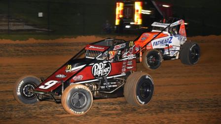 Eventual winner Kevin Thomas Jr. (#9K) goes toe-to-toe with Brady Bacon (#69) during Friday night's USAC AMSOIL National Sprint Car feature at Bloomington (Ind.) Speedway. (David Nearpass Photo) (Video Highlights from FloRacing.com)
