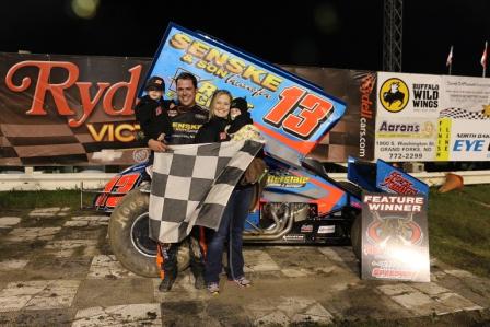 Mark and the family in Victory Lane at River Cities (Rick Rea – www.RickRea.com Photo)