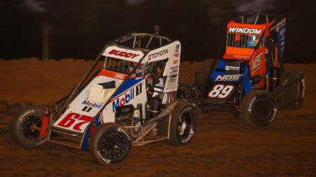 Buddy Kofoid (#67) slides past Chris Windom (#89) for the lead during Friday night's Indiana Midget Week feature at Bloomington Speedway. (DB3, Inc. Photo) (Video Highlights from FloRacing.com)