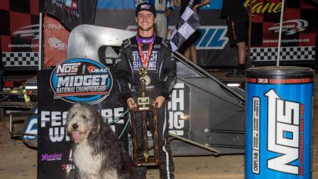 Logan Seavey and his Sheepadoodle, Cooper, are all smiles after Logan won Saturday night's USAC NOS Energy Drink National Midget "Indiana Midget Week" feature at Lawrenceburg Speedway. (Rich Forman Photo) (Video Highlights from FloRacing.com)