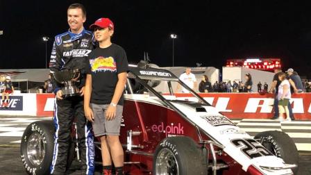 Winner Kody Swanson (Kingsburg, Calif.) and his victory lane guest, Charlie Leffler.