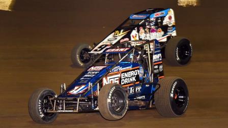 Justin Grant (#4) slides to the lead past Kevin Thomas Jr. (#9K) during Saturday night's NOS Energy Drink Indiana Sprint Week by AMSOIL feature event at Kokomo Speedway (David Nearpass Photo) (Video Highlights from FloRacing.com)