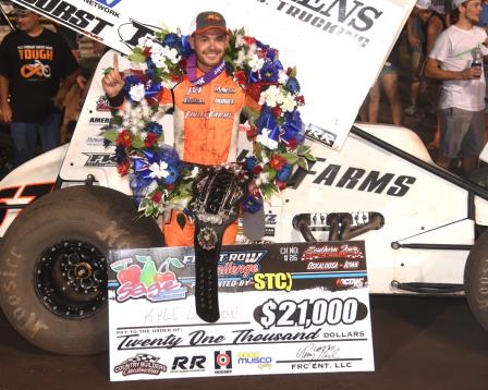 Kyle Larson celebrates his win at the Front Row Challenge in Oskaloosa Monday (Paul Arch Photo)