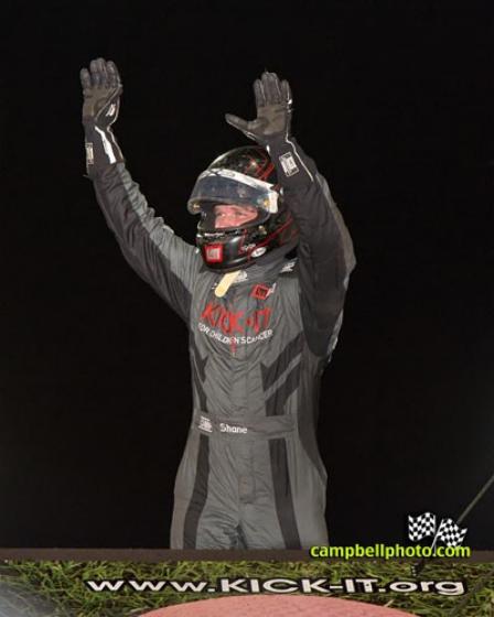 Shane Stewart celebrates his prelim win at the Knoxville Nationals (Mike Campbell Photo)