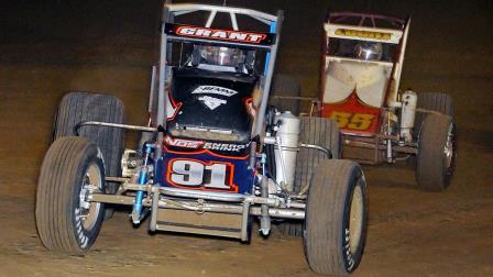 Justin Grant (#91) leads the way to victory over Jerry Coons Jr. (#55) during the final laps of Sunday night's Sumar Classic USAC Silver Crown season opener at the Terre Haute (Ind.) Action Track. (Lonnie Wheatley Photo) (Video Highlights from FloRacing.com)