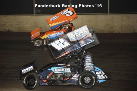 Jerrod battles with Brad Loyet in their heat race at Tri-City Speedway (Mark Funderburk Racing Photo)