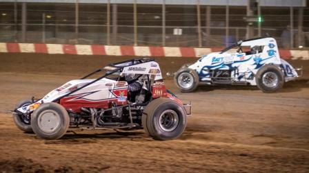 Robert Ballou (#12) passes Davey Ray (#14AJ) en route to victory during Sunday night's USAC AMSOIL Sprint Car National Championship feature at Sun Prairie, Wisconsin's Angell Park Speedway. (Dave Olson Photo) (Video Highlights from FloRacing.com)