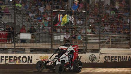 Mitchel Moles (Raisin City, Calif.) races under his first checkered flag in USAC NOS Energy Drink Midget National Championship competition after scoring the victory in Friday's opening night of the Midwest Midget Championship at Fairbury, Nebraska's Jefferson County Speedway. (Jeff Taylor Photo) (Video Highlights from FloRacing.com)