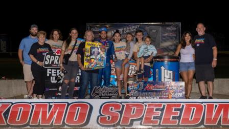 World of In-Laws: Justin Grant celebrates with wife Ashley Grant (Bubby Jones' daughter) and the Jones family in victory lane after capturing Tuesday night's USAC NOS Energy Drink Indiana Sprint Week round at Kokomo Speedway. (Rich Forman Photo) (Video Highlights from FloRacing.com)