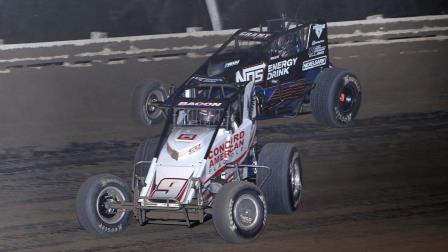 Winner Brady Bacon (#9) battles Justin Grant (#91) for the lead during the final laps of Saturday night's USAC Silver Crown National Championship season opener at the Belleville (Kan.) High Banks. (Chris Pedersen Photo) (Video Highlights from FloRacing.com)