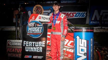 Gavin Miller (Allentown, Pa.) stands proudly in victory lane following his first career USAC NOS Energy Drink Midget National Championship feature victory on Friday night at Bloomington (Ind.) Speedway. (Indy Racing Images Photo) (Video Highlights from FloRacing.com)