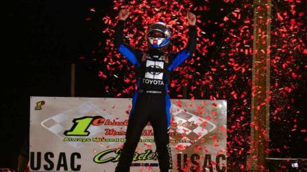 A triumphant Bryant Wiedeman celebrates his first career USAC NOS Energy Drink Midget National Championship victory following Wednesday night's Chad McDaniel Memorial at the Mitchell County Fairgrounds in Beloit, Kan. (Rich Forman Photo) (Video Highlights from FloRacing.com)