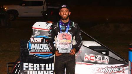 Tanner Thorson (Minden, Nev.) stands victorious following Friday night's Jason Leffler Memorial Presented By Peoples National Bank victory at Wayne County Speedway in Wayne City, Illinois. (Rich Forman Photo) (Video Highlights from FloRacing.com)