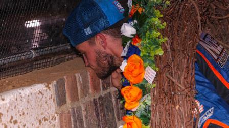 Justin Grant (Ione, Calif.) kisses the bricks after winning Saturday night's Driven2SaveLives BC39 at The Dirt Track at Indianapolis Motor Speedway. (Jack Reitz Photo) (Video Highlights from FloRacing.com)