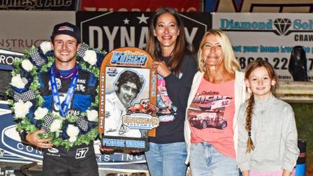 Friday's Sheldon Kinser Memorial winner Logan Seavey is joined in Bloomington Speedway victory lane by Sheldon's daughter, wife and granddaughter. (David Nearpass Photo) (Video Highlights from FloRacing.com)