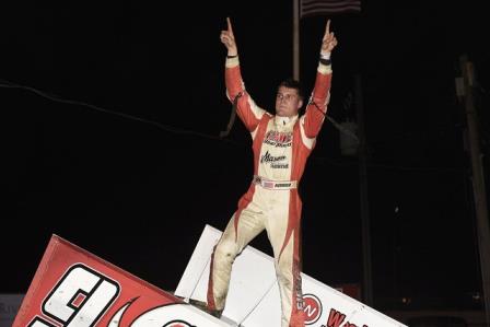 Paul Nienhiser celebrates his IRA win in West Burlington (Mark Funderburk Racing Photo)