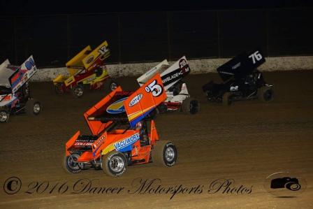 Photo: Brad takes the low line at Cotton Bowl Speedway (Dancer Motorsports/ASCS Photo)