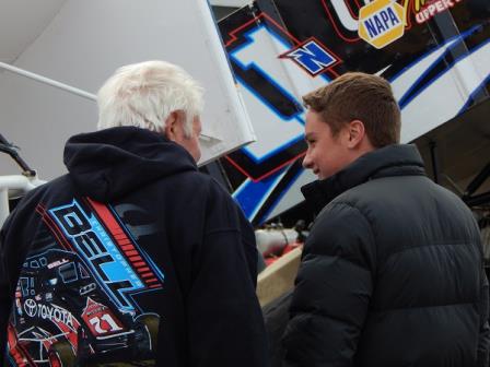 Rick Ferkel talks things over with Christopher Bell