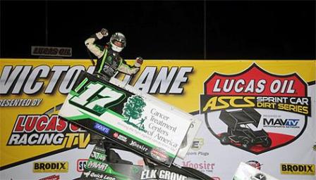 Bryan celebrates his victory at Creek County (Lonnie Wheatley/ASCS Photo)