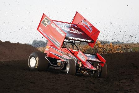 Wayne heading for photographer Jeff Bylsma and the tires in turn two during Saturday’s qualifying.  Jeff took evasive action (Jeff Bylsma Photo)