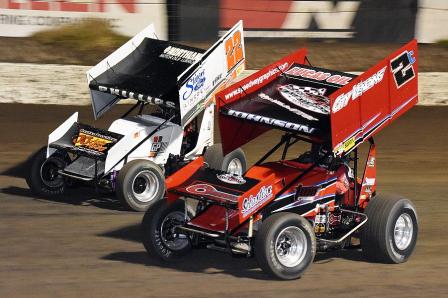 Wayne races beside Rager Phillips at I-80 Speedway (Jeff Bylsma Photo)