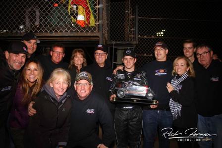 Brady and the FMR #76m race team show off their Jason Leffler Fast Time trophy (www.RichFormanPhotos.com) 