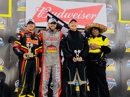 Ryan Roberts (360), Brian Brown (410) and Eric Bridger (305) were victorious and are with flagman Doug Clark on Cinco de Mayo at Knoxville (Knoxville Raceway Photo)