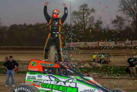 Kevin Thomas, Jr. cagestands after winning Saturday's USAC AMSOIL National Sprint Car feature at Plymouth (Ind.) Speedway (Ryan Sellers Photo)