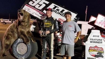 Matt Covington meets Adam the Grizzly Bear at Belgrade, Montana's Grizzly Nationals July 6